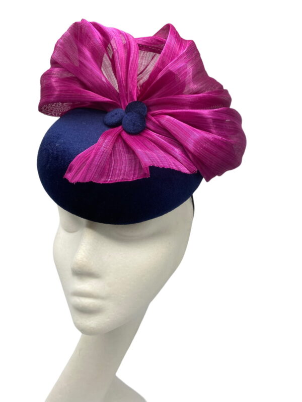 Gorgeous navy velvet headpiece with pink jinsin fan detail.